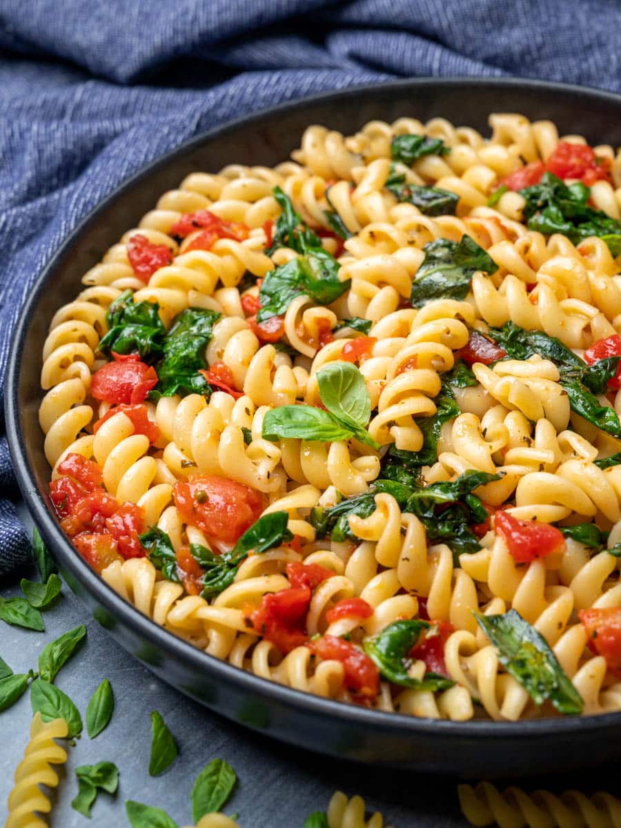a plate of tomato basil pasta