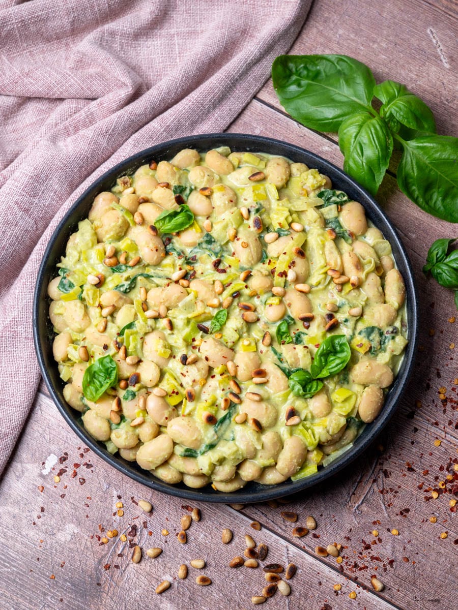a plate of pesto butter beans
